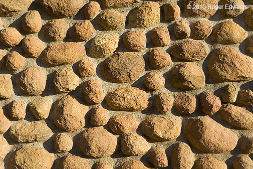 Cobbles in the wall of an abandoned house